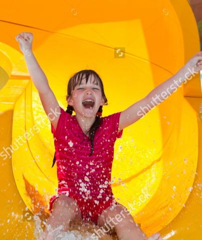 stock-photo--happy-girl-on-waterslide-85549924.jpg